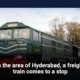 In the area of Hyderabad, a freight train comes to a stop